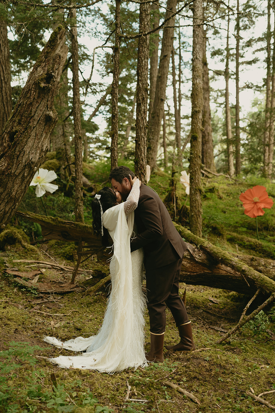 Newly married couple kiss passionately after being married as husband and wife.