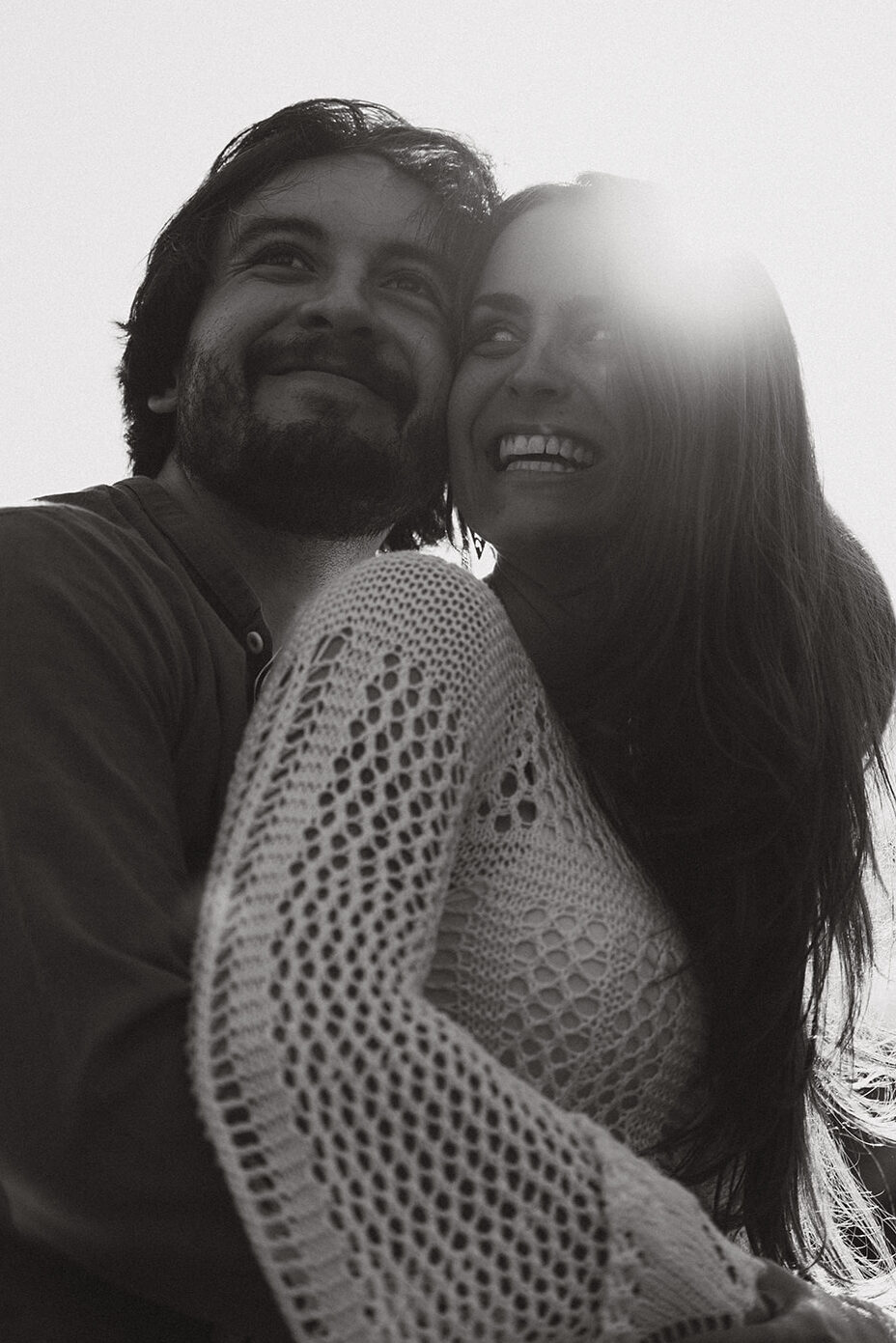 Couple embracing each other and laughing on the San Juan Islands
